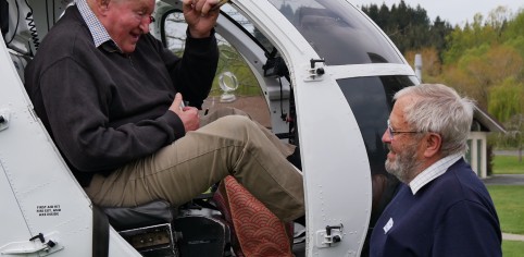 Sir Tim Wallis feeling right at home in the helicopter at the Invermay 50th celebrations with xxx right
